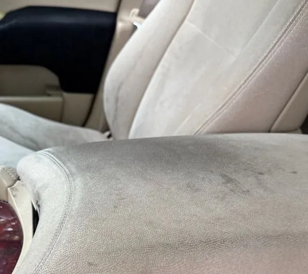 Before — stained suede seats